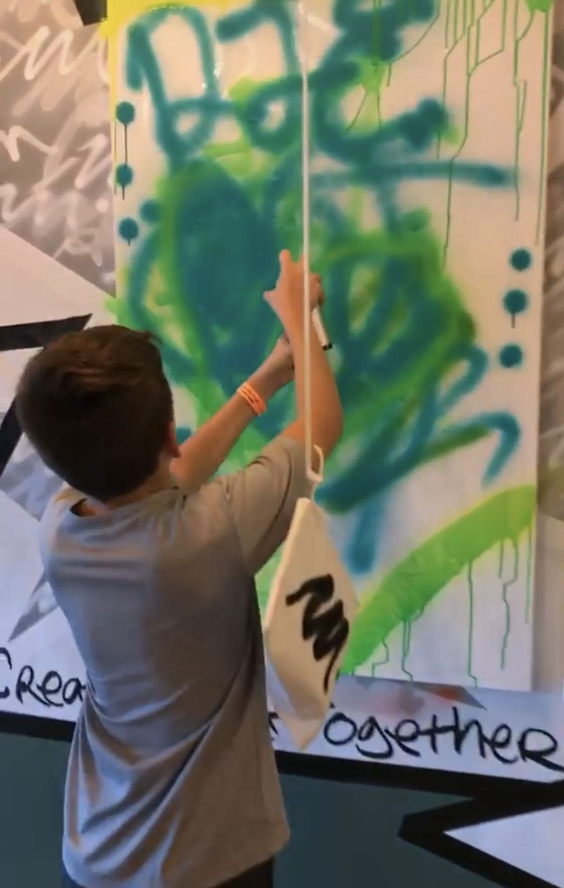 Guests adding color to the canvas