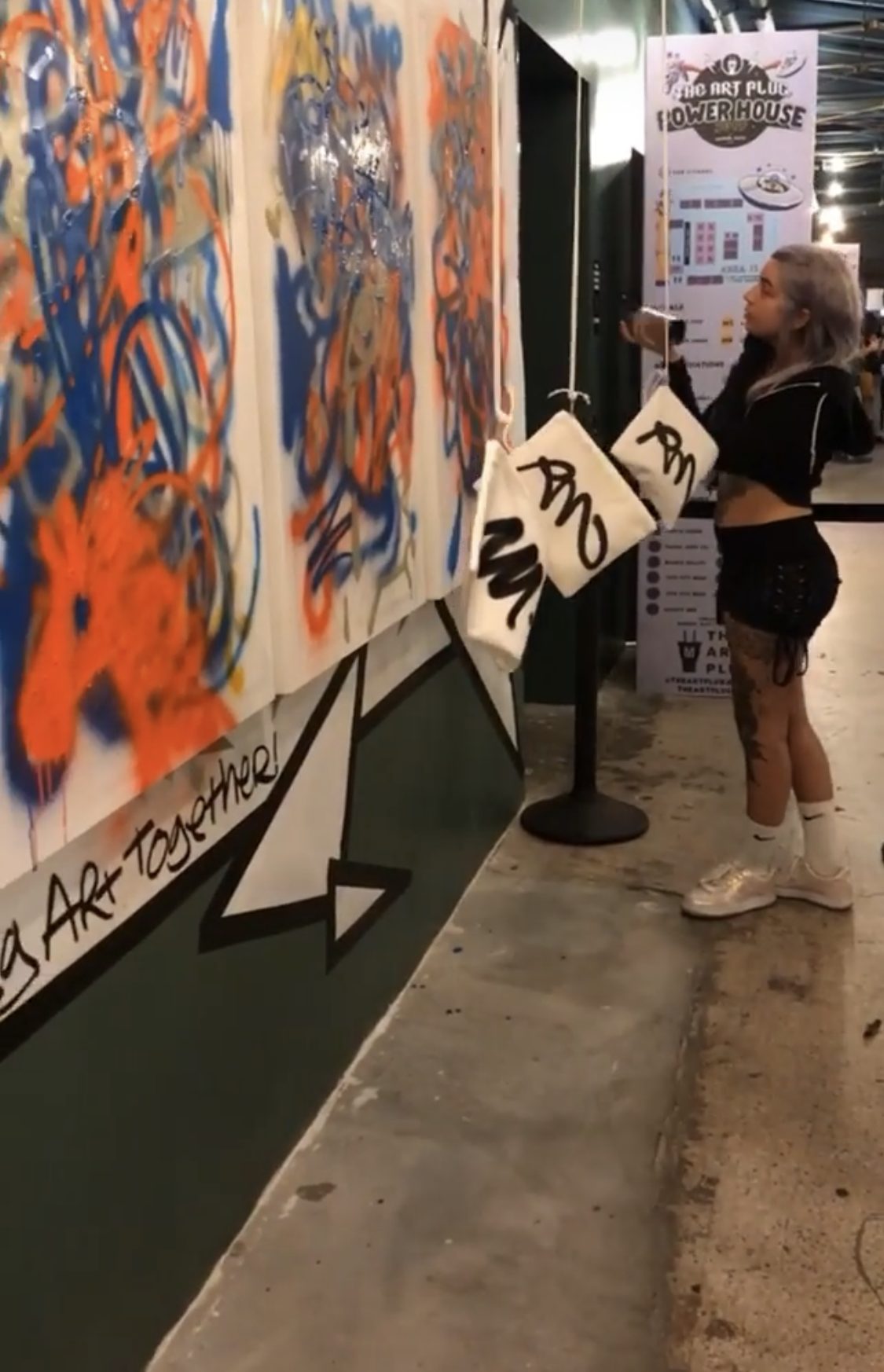 The group at work on the canvas