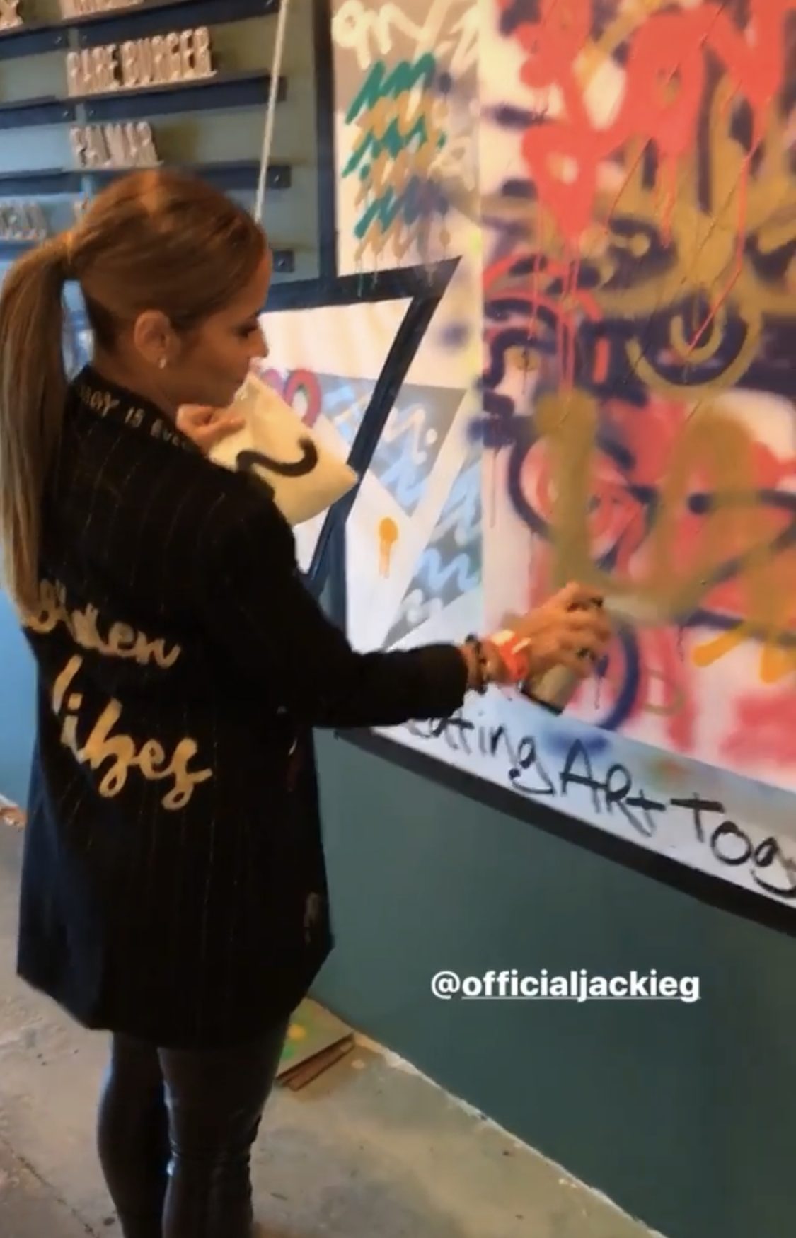 Guests spray-painting together