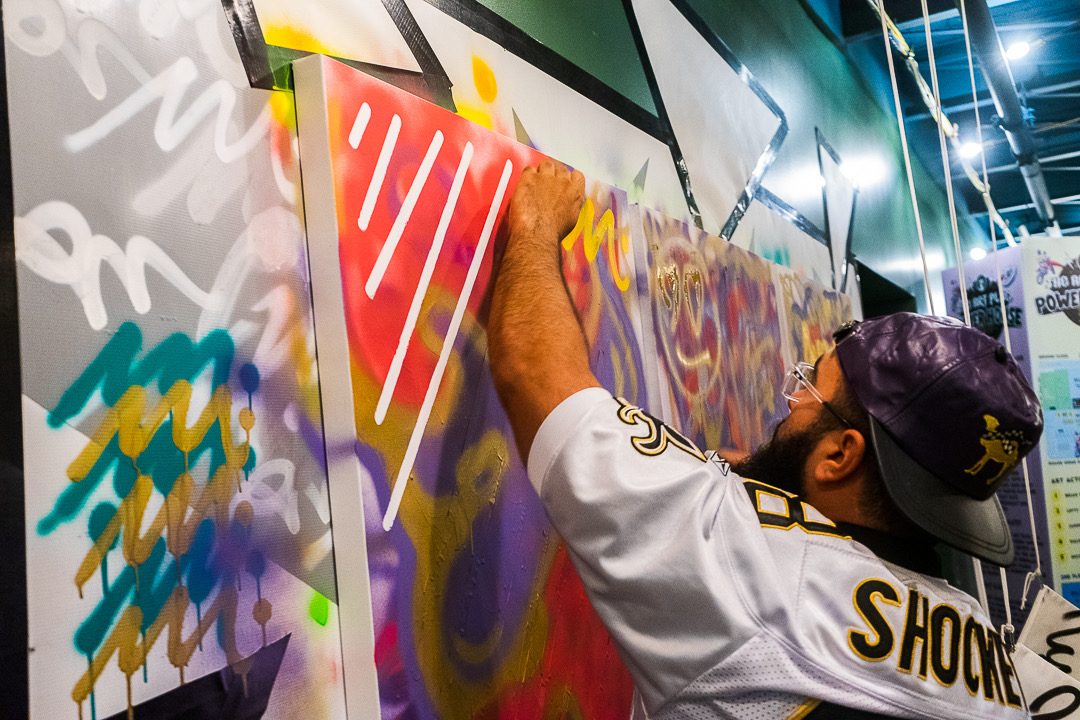 The moment a Creating Art Together canvas is revealed